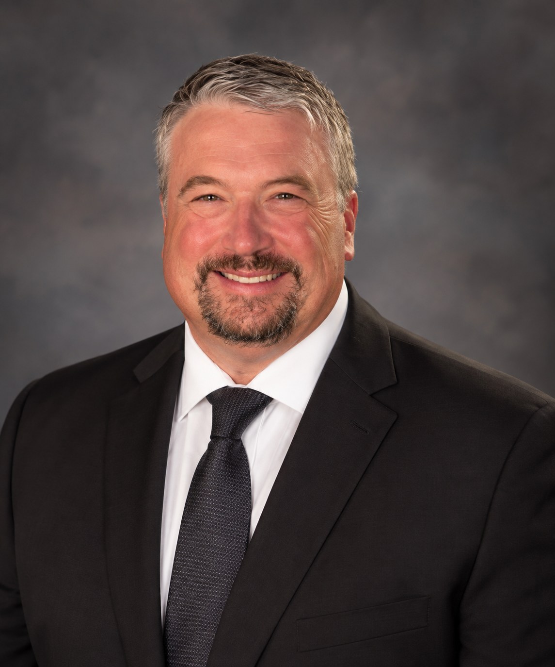 Robert LePage, New Jersey REALTOR®, in a dark suit